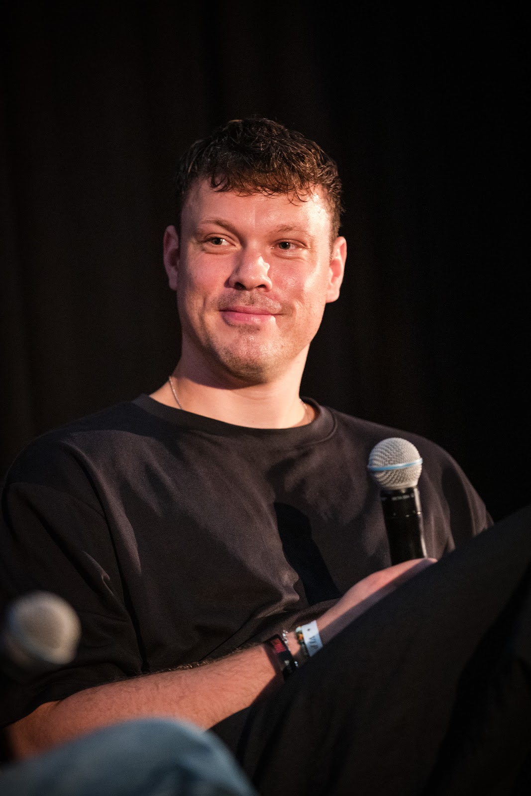 Close-up of a panel speaker at Board Summit 2025